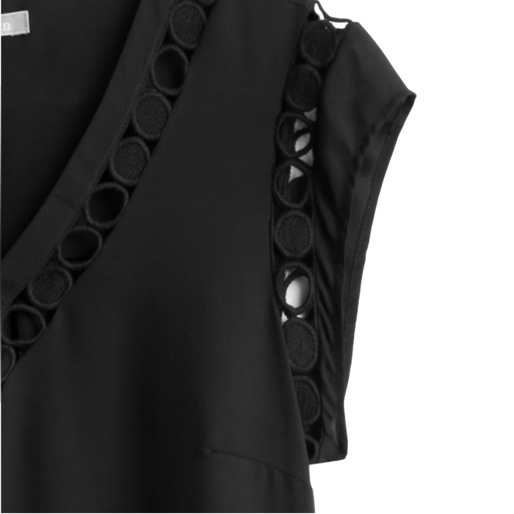 Donated - not for sale.
Cutout Detail Blouse in black - Picture 3 of 4